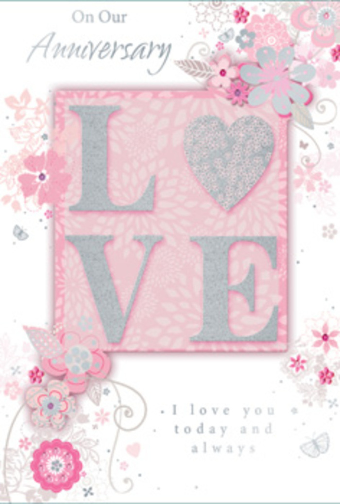 The anniversary card pictured suggests the feeling of stepping into a sunlit Rickmansworth sitting room where love is quietly honoured every day. Dominating the centre is the word LOVE, each capital letter rendered in an elegant, frosted glitter that lifts from the card in tactile relief. The glitter finish is soft and velvety to the eye, catching the light with a restrained shimmer rather than a harsh sparkle, much like the way light dances off petals in a florist's display near Rickmansworth station. Surrounding this central motif, the background spreads out in a comforting blush pink, gently shaded in places so it feels almost like layered tissue paper used to wrap a bouquet. Along the borders and edges, wispy, hand-drawn blooms and soft floral sprays drift in from the sides, their petals coloured in muted tones of pink, lilac, and creamy ivory. Each illustration is made up of confident yet fine lines, subtle shading, and feather-light flourishes, evoking the artistry of planning a hand-tied bouquet for an anniversary surprise. Intertwined with the blossoms are delicate leaves and filigree curls, along with tiny, almost-hidden butterflies that appear where vines curl or petals overlap, suggesting the flutter of hearts on a special day. The main message, including the sentiment I love you today and always, is printed in gracious, understated script, the letters slender and flowing, balanced between formality and warmth. Overall, the design feels like a bouquet translated into paper-gentle, layered, and full of emotion-perfect for an anniversary celebration in a Rickmansworth home overlooking the canal or local parks.
