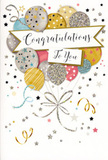 In this detailed image of a congratulations card, a joyful bouquet of illustrated balloons rises gracefully, as if lifting the mood of an entire room in Rickmansworth. The balloon cluster fills the upper half of the card, each rounded shape overlapping gently with the next, creating a soft, cloud-like mass. The colours are elegant and celebratory: rich metallic gold and silver sit alongside champagne, dusky sky blue, blush pink, and gentle grey. Several balloons are sprinkled with fine glitter, catching the light in tiny specks, while others are patterned with small stars or slender stripes that give a sense of texture and craftsmanship. From the base of the cluster, thin golden and silver ribbons trail downward in playful curves, twisting and looping with the same easy movement you might see in a party display at a home near the Rickmansworth aquadrome. Surrounding the balloons, scattered stars, dots of confetti, and graceful swirls float across a soft, neutral background, echoing the carefree energy of a surprise celebration. Stretching across the centre of the design is a slightly arched banner, its edges gently curled as though caught mid-breeze. On it, the message Congratulations To You is written in flowing, stylish script that feels both heartfelt and polished. The tones remain light and airy, with the metallics adding a touch of glamour that never feels too loud. Looking at the card, you can imagine the faint, rough sparkle of glitter beneath your fingertips and the smooth shine of the printed ink. It is the perfect partner to a fresh bouquet delivered locally, whether for exam results, a new chapter in someone's career, or any proud moment you'd want to honour in and around Rickmansworth.